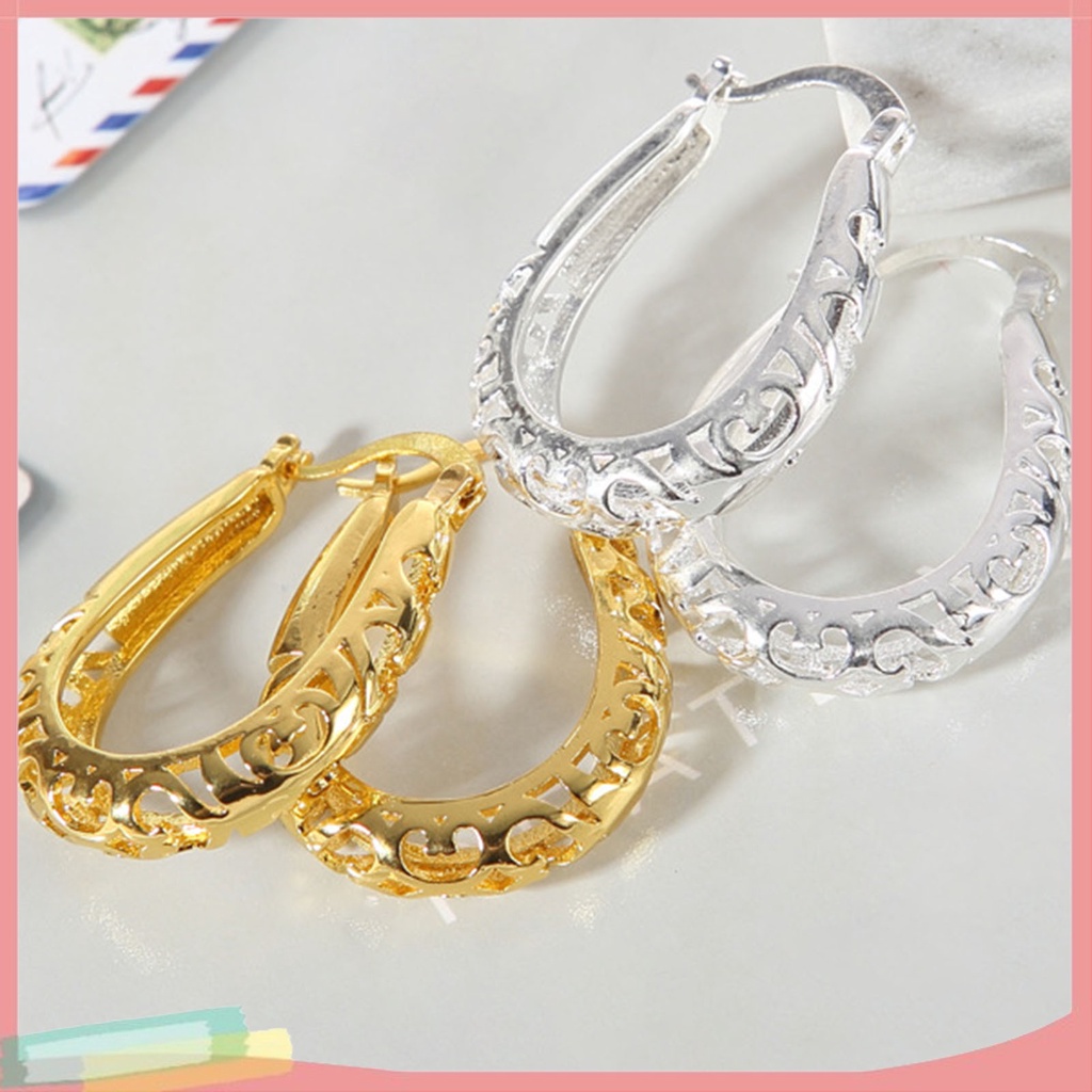 1 đôi khuyên tai hình tròn phối hoa rỗng thời trang cho nữ