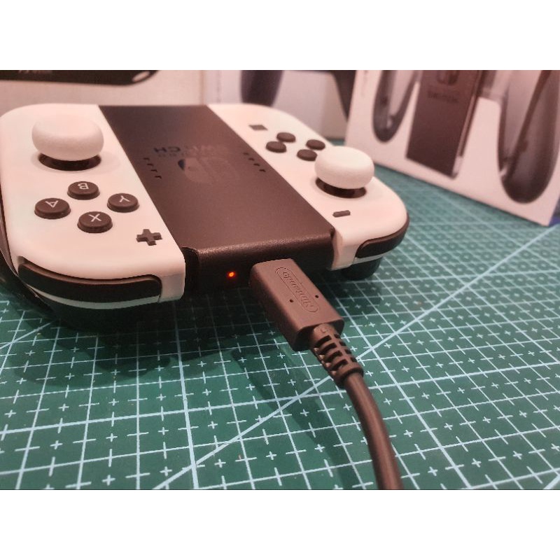 Grip sạc cho Joycon máy Nintendo Switch