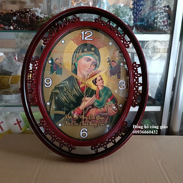 Đồng hồ treo tường oval có in hình size 45x35 đồng hồ trang trí quà tặng công giáo