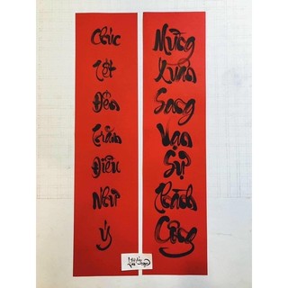 căp đối gia tiên thư pháp( viết trên giấy liễng)