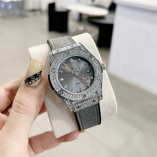 Đồng hồ nữ Hub mặt tròn 36mm đính đá dây silicon thơm DHN601