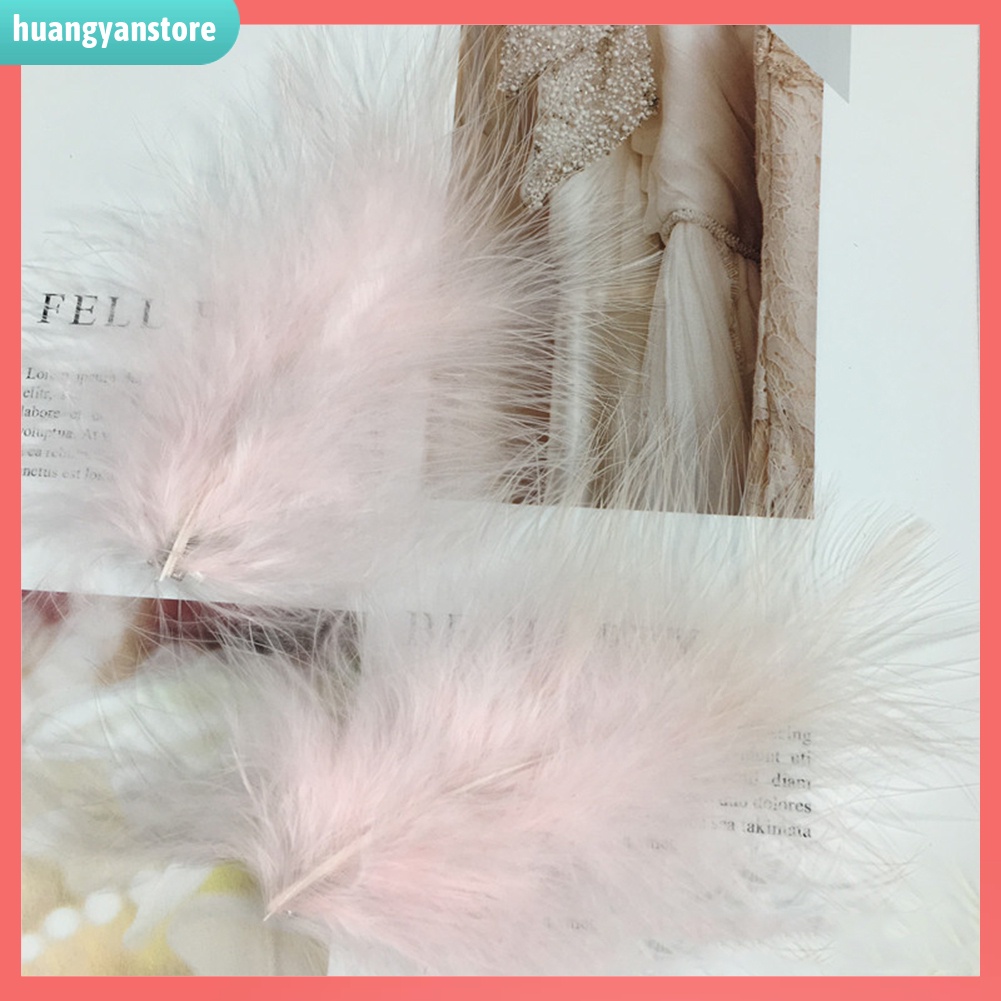 HY/ 2 kẹp tóc lông vũ đính đá và ngọc trai giả