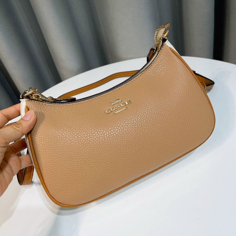 Túi C0a**ch Teri Mẫu dáng thuyền kẹp nách sang chảnh