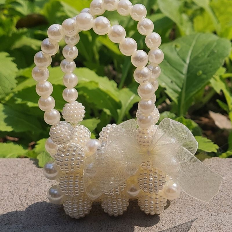 Túi ngọc cho bé gái, Túi ngọc cầm tay bé gái