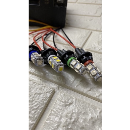 Xi nhan 2 tầng 9led gắn xe máy