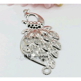 miếng kim loại hình chim công
