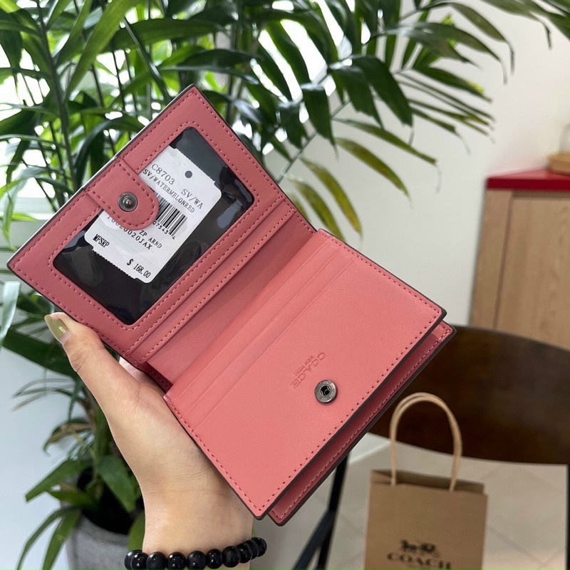 Túi coach nắp gập