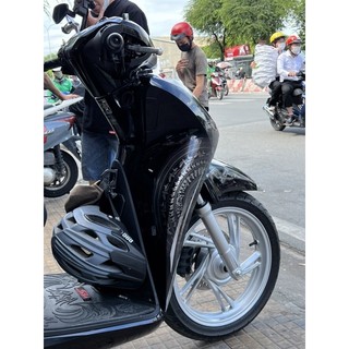 Tem trống đồng Sh