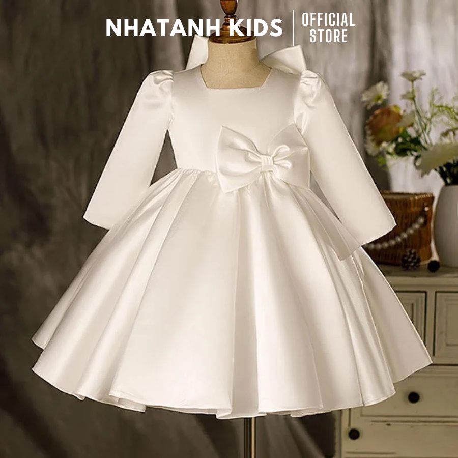 Đầm công chúa bé gái NHATANH KIDS màu trắng tay dài gắn nơ đằng sau cho bé từ 0-12 tuổi NA06