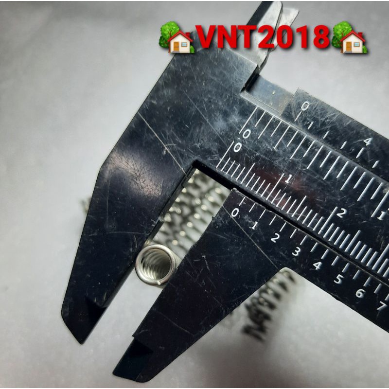 Lò xo nén inox304 phi 7mm sợi 1mm