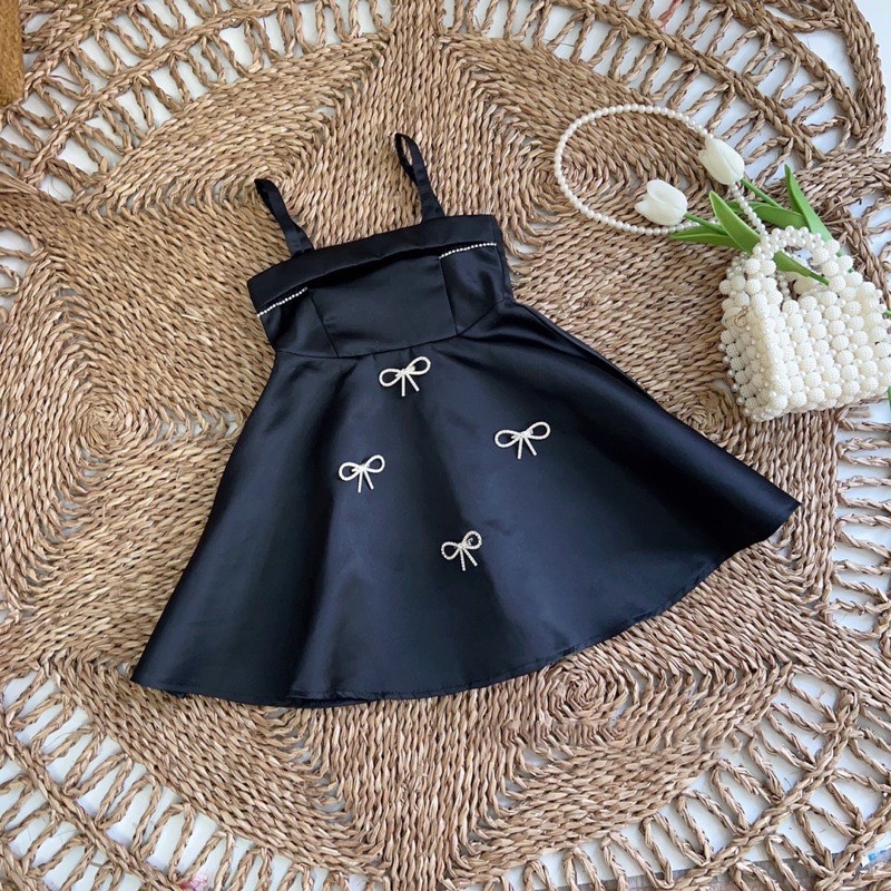 Váy đầm tacta 2 dây đính nơ cho bé gái 9-28kg
