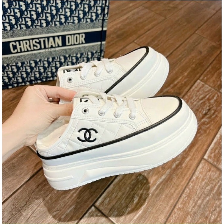Giày sục thể thao nữ da trần chỉ độn đế 7cm thêu chữ X