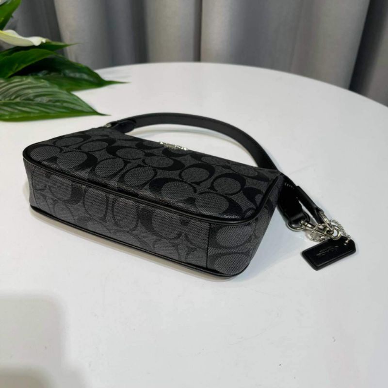 Túi c 0ách da thật 🐂 100% ạ, mẫu unisex cả nam vs nữ đều đeo được nhé