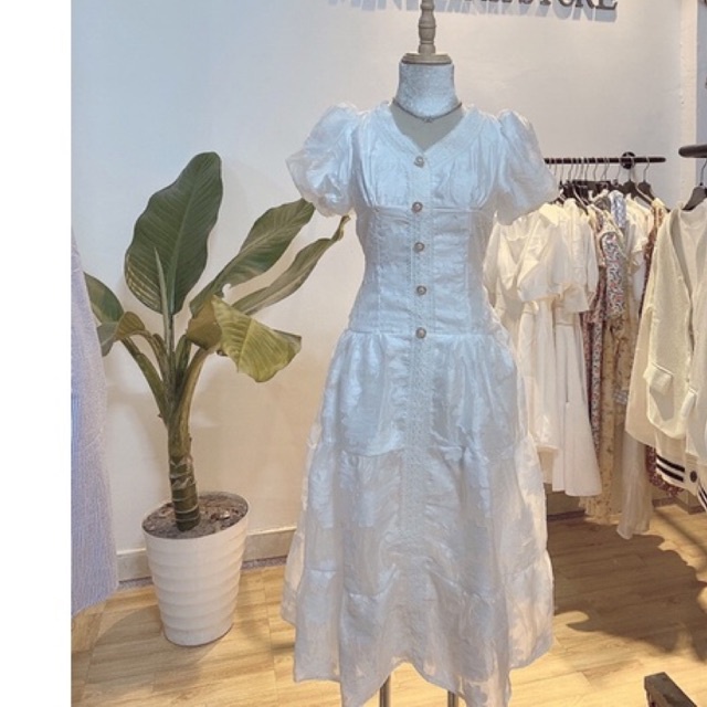 Đầm gấm hoa nút ngọc