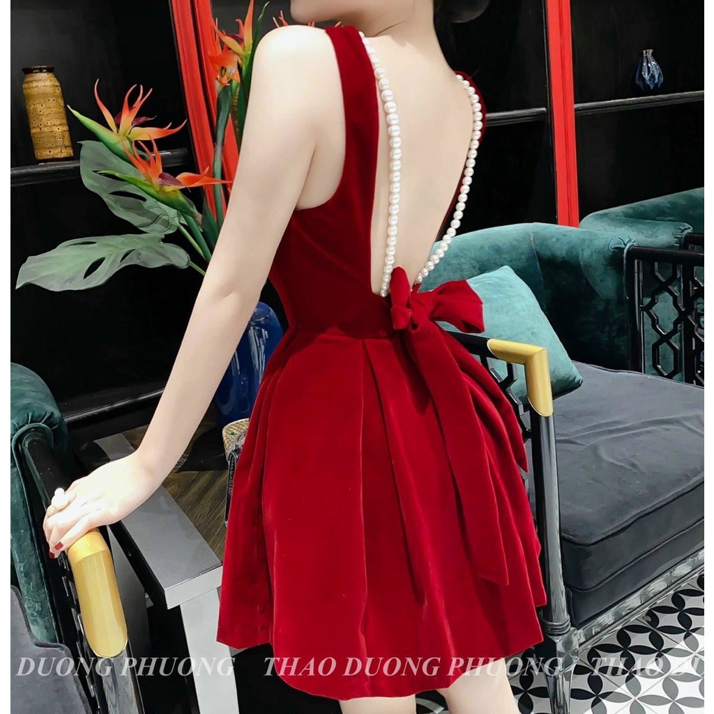 đầm xòe nơ lưng đính hai chuỗi cườm có mút cực xinh