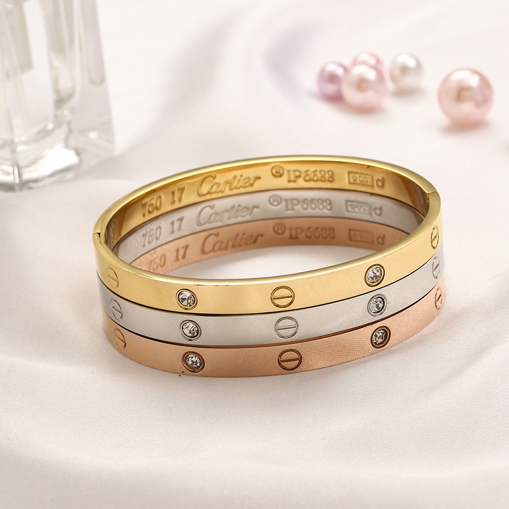 CARTIER Vòng Đeo Tay Bằng Thép Titan Họa Tiết Logo Chữ Cái Rỗng