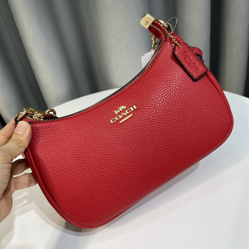 Túi Coa**ch Teri dáng thuyền da thật sang chảnh