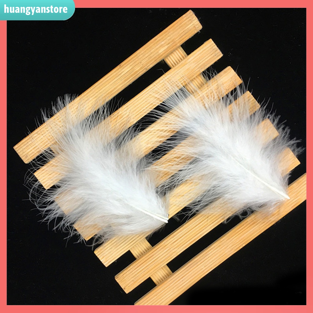 HY/ 2 kẹp tóc lông vũ đính đá và ngọc trai giả