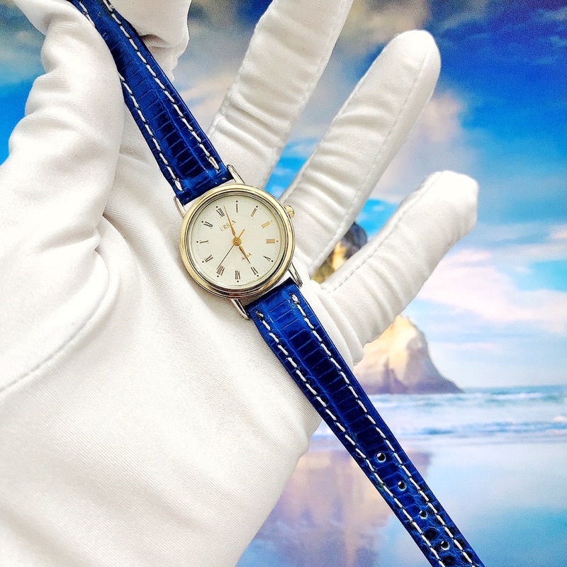 Đồng hồ nữ si hiệu Alba, mặt tròn dây da, cọc số la mã