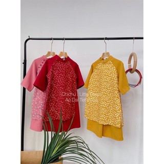 Set áo dài cách tân tay phối lụa kèm cài ngọc