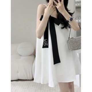 đầm hai dây cột nơ dáng xoè