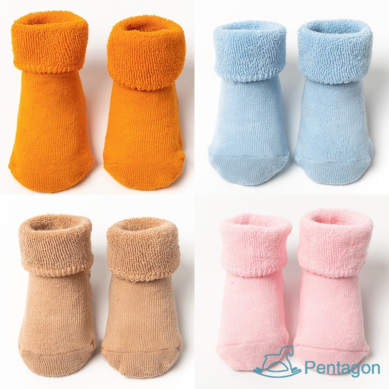 Đôi Vớ Cotton Dài Màu Trơn Chống Trượt Dễ Thương Cho Bé