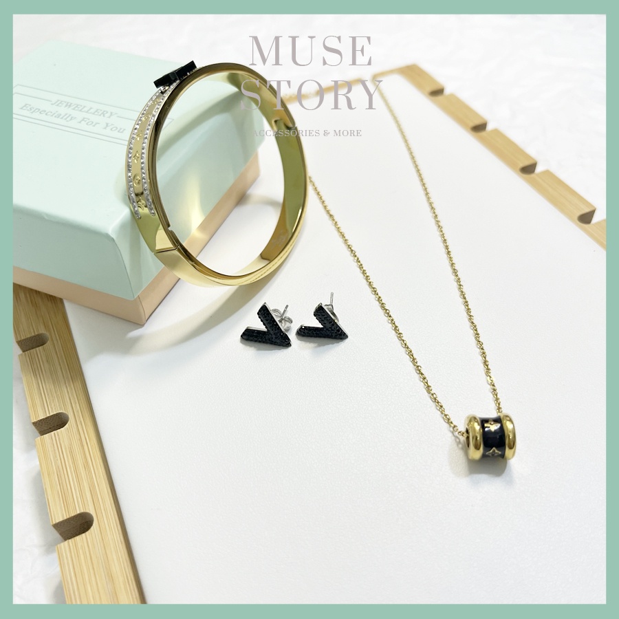 Set phụ kiện titan 03 món dây chuyền, khuyên tai, lắc tay form vòng cứng Eo Vì, có tách lẻ - Muse Story