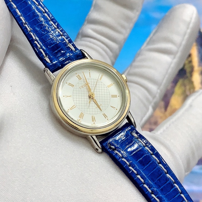 Đồng hồ nữ si hiệu Alba, mặt tròn dây da, cọc số la mã