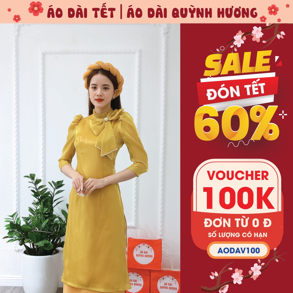 Áo dài Tết chất voan tơ đính nơ cổ cách điệu màu vàng by Quỳnh Hương