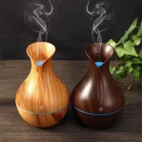 Máy xông tinh dầu vân gỗ tròn hình lọ hoa phun sương đuổi muỗi sieuthihonam