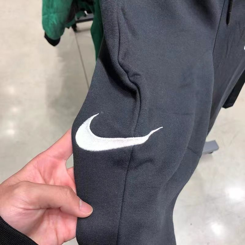 Nk nam giới móc đôi thêu quần bó sát dệt kim thông thường quần thể thao cj4881