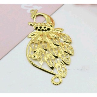 miếng kim loại hình chim công