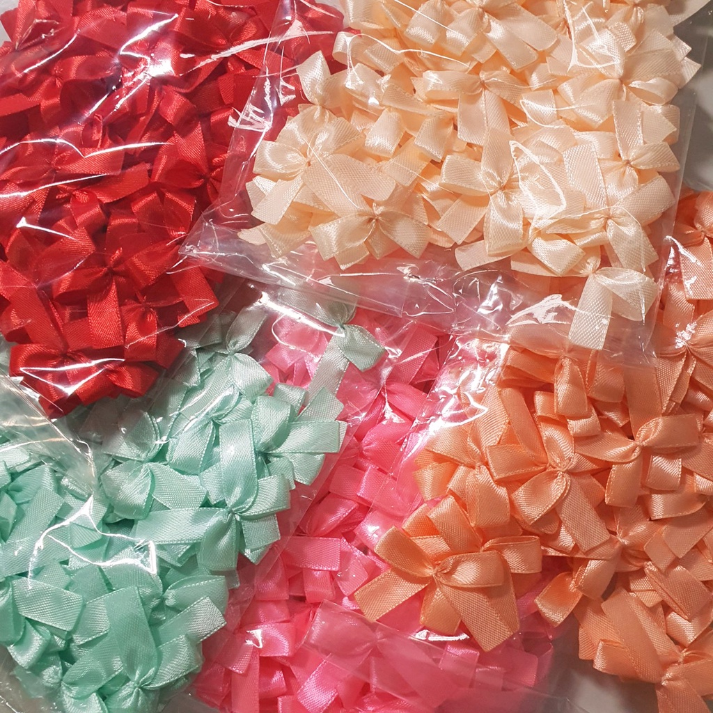 Nơ lụa cột sẵn trang trí - bản rộng 1cm (không tưa đuôi nơ)