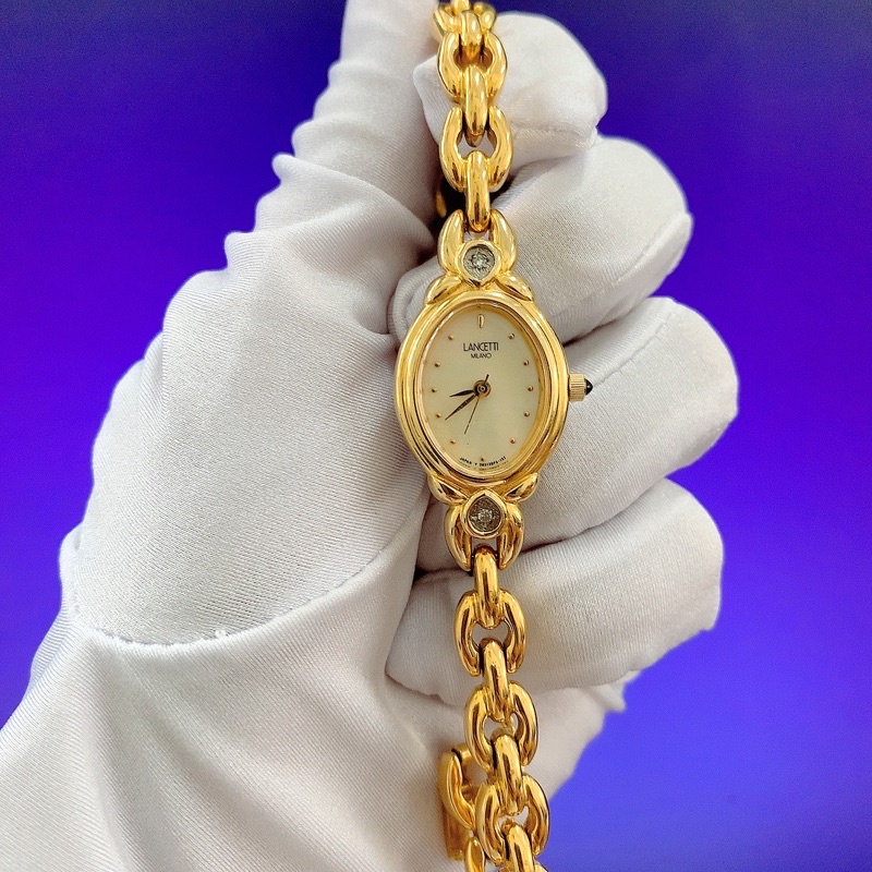 Đồng hồ si nữ hiệu Lancetti Milano, máy Nhật dáng lắc vàng, đính đá
