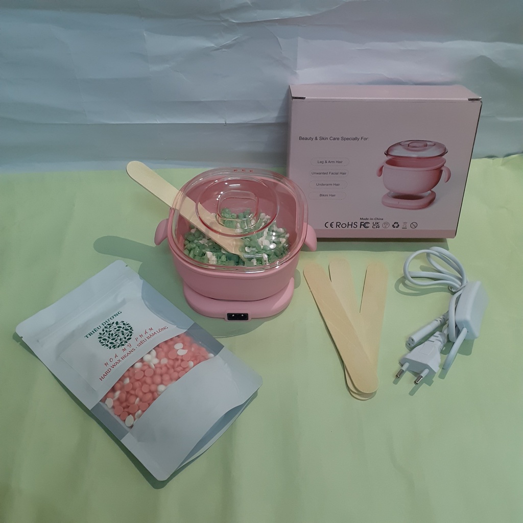 Quà tặng sốc khi mua Nồi nấu sáp wax tẩy lông silicon dòng mini chống dính kèm 100gr sáp siêu bám lông.