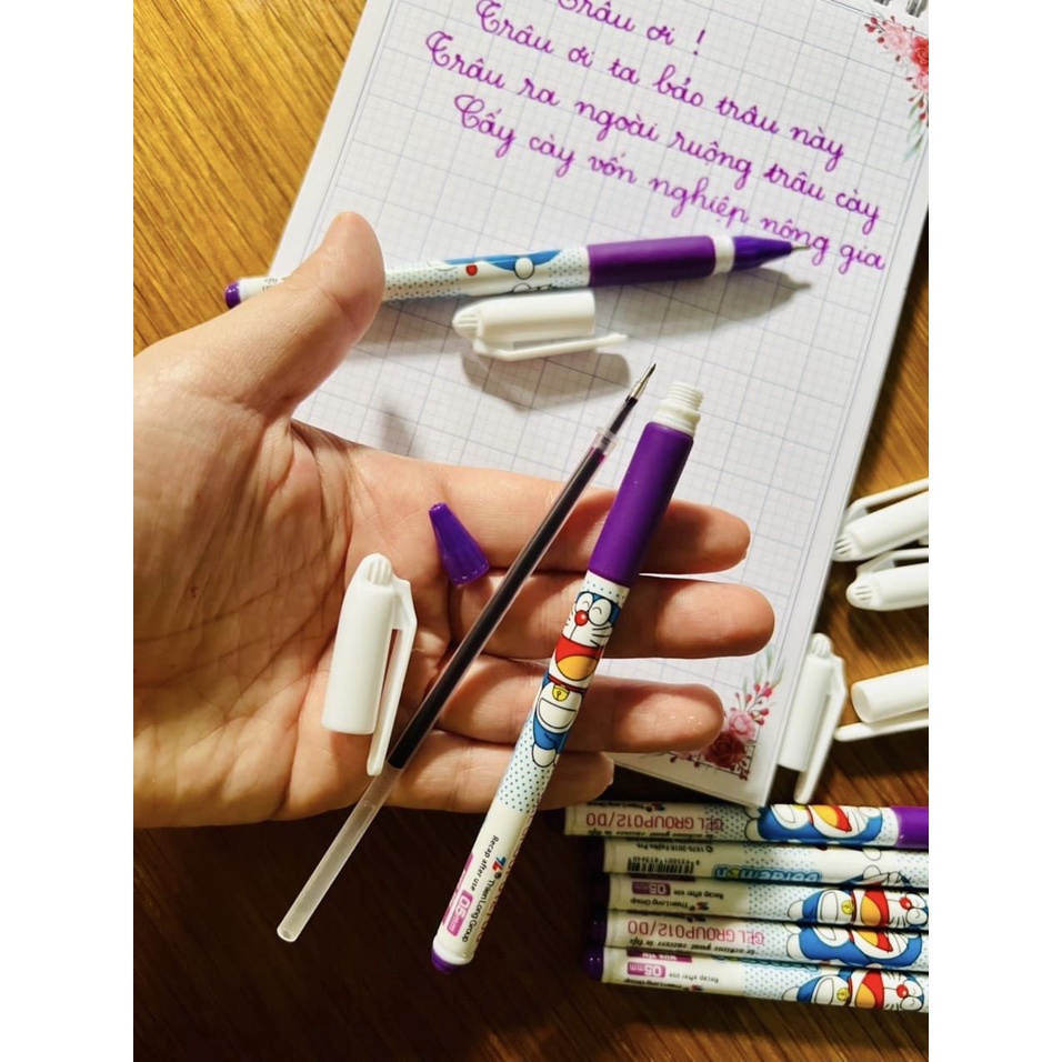 SET Bút bi nước, bút gel DOREMON MỰC TÍM nét đậm cho bé tiểu học -  tặng Chun tóc đáng yêu cho bé yêu