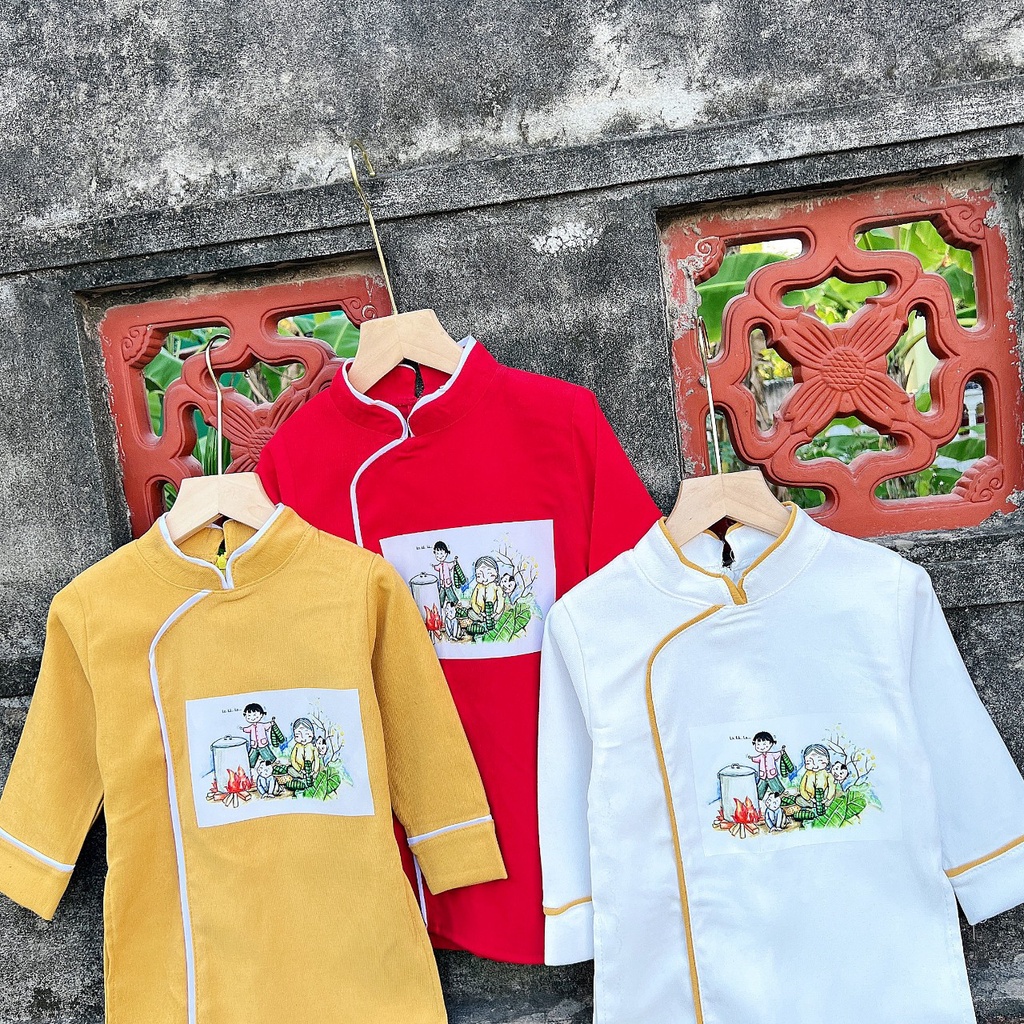 Áo dài cách tân xinh xắn, nhiều màu sắc, in họa tiết Tết cổ truyền hoặc thêu họa tiết rồng cho bé trai diện Tết