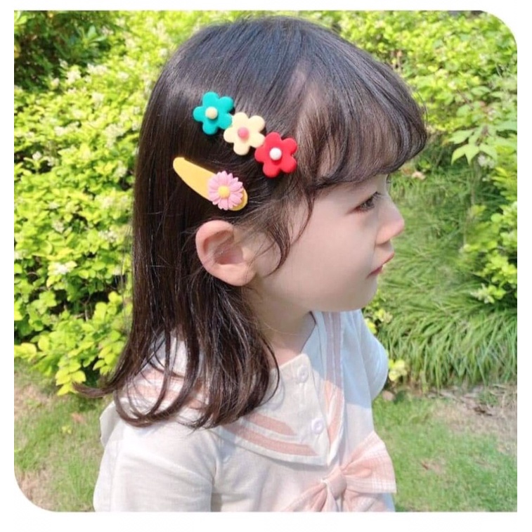 Séc kẹp tóc bé gái
