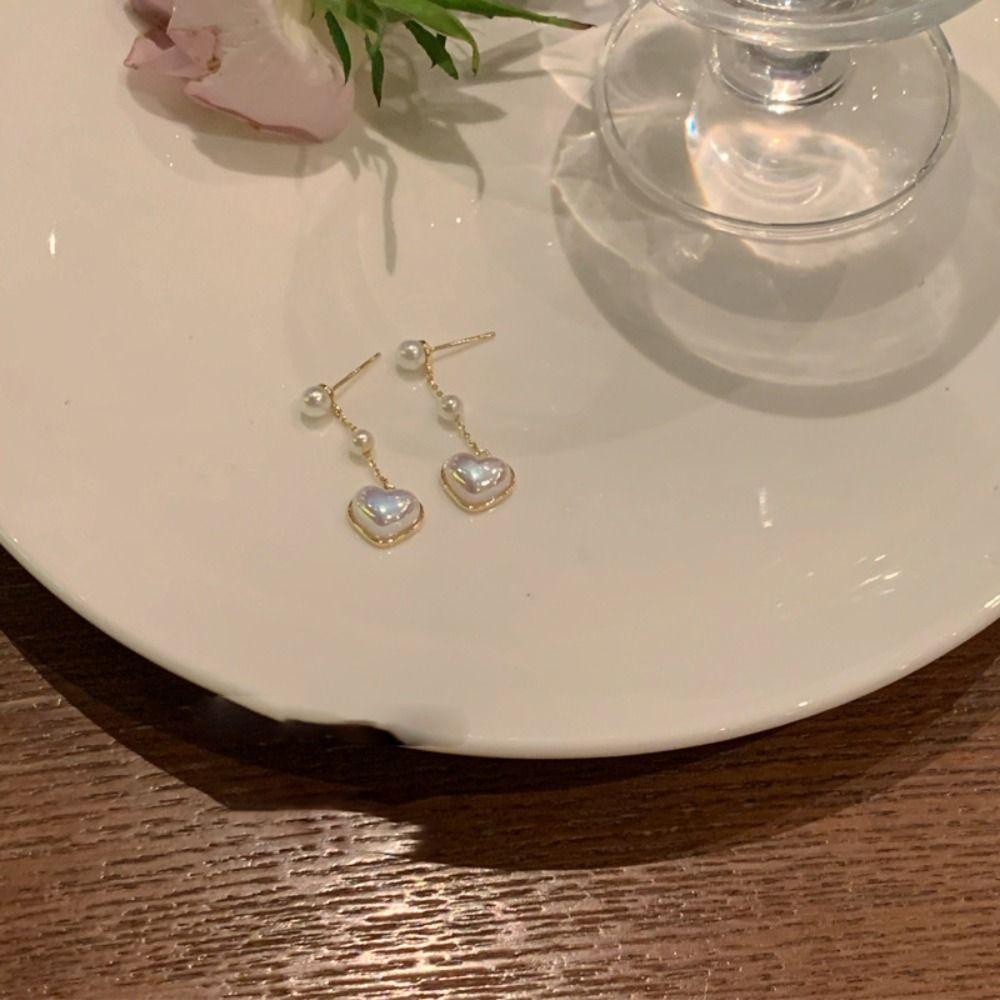 Bông Tai Hình Trái Tim Đính Nơ Sang Trọng Cho Nữ