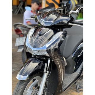 Tem trống đồng Sh