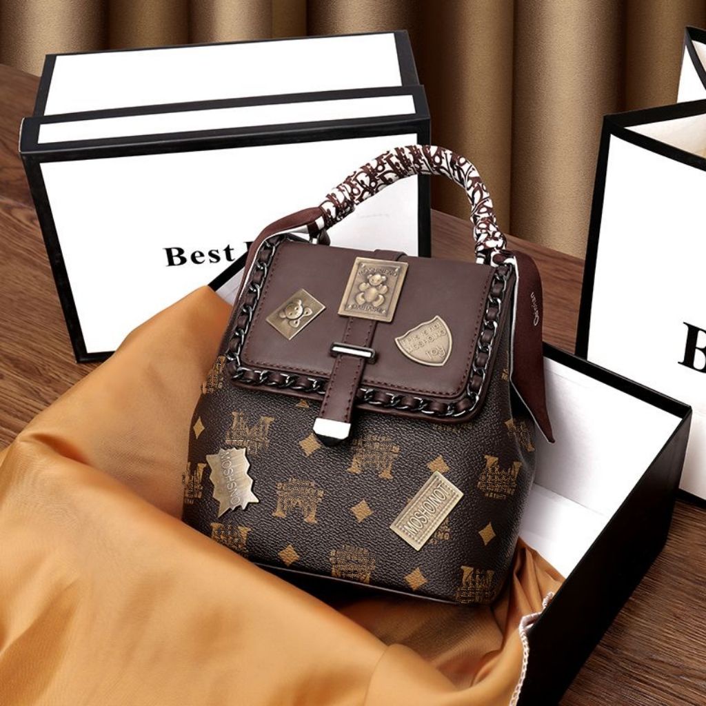 Hot backpack hot backpack women's bag new casual shoulder messenger bag large capacity badge small backpack dual-purpose bag