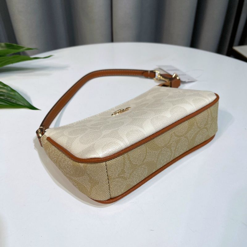 Túi Coac*h Nolita 19 kẹp nách sang trọng