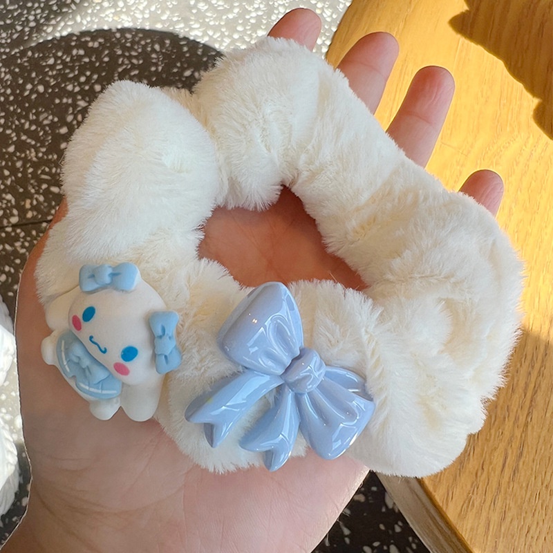 Cột tóc lông chó trắng tai to cute