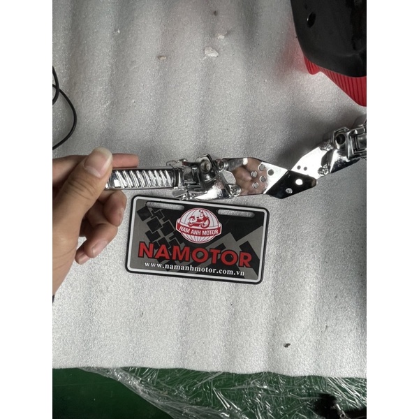 Gạt để chân xe điện Xmen