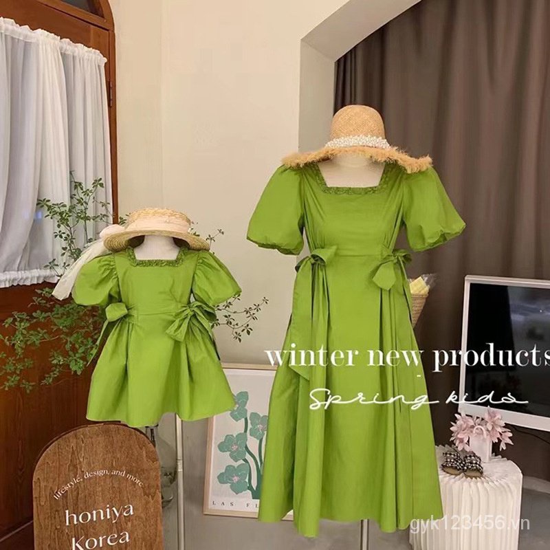 Đầm Tay Phồng Đính Nơ Màu Xanh Bơ Phong Cách Phương Tây Thời Trang Mùa Hè Cho Mẹ Và Bé 77075