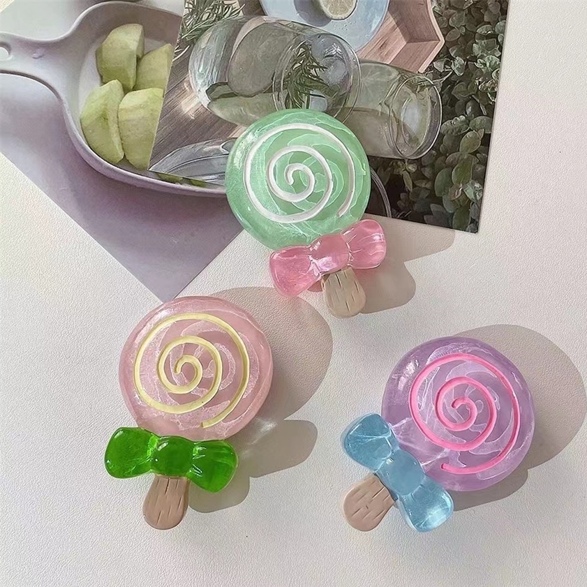 Giá Đỡ Điện Thoại Hình Kẹo Mút Dễ Thương