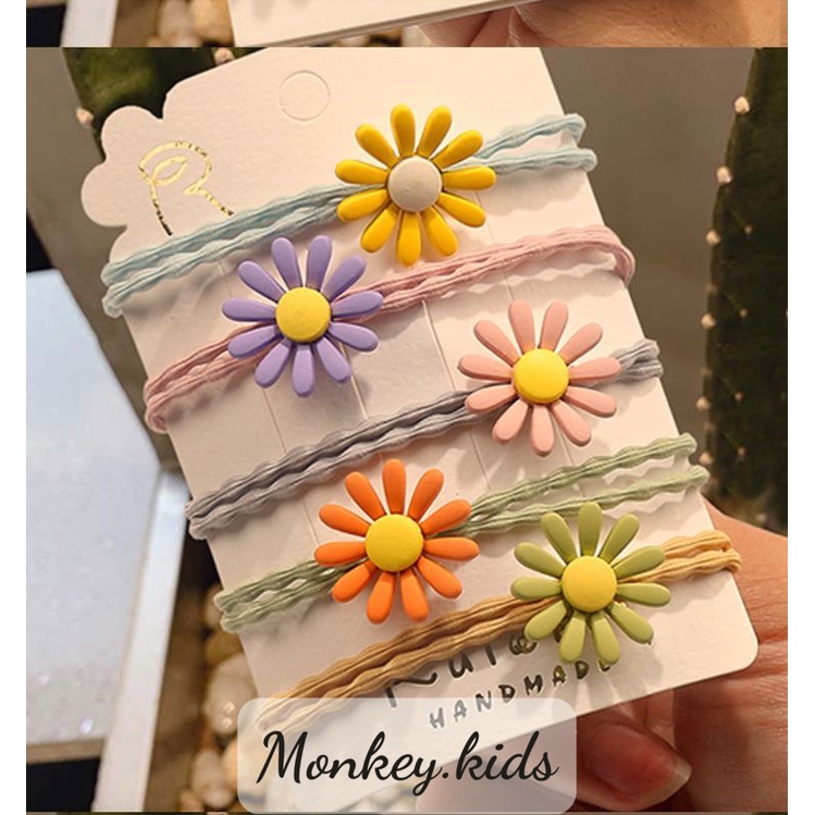 Dây buộc tóc hoa mặt trời các màu cho bé