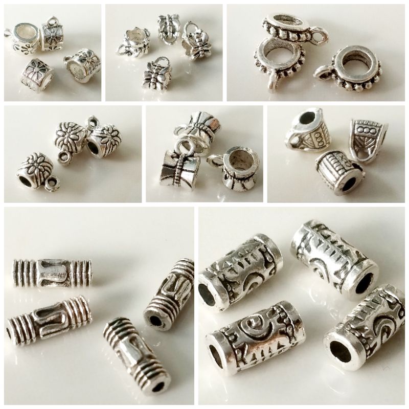 Charm ống xỏ lùa bạc Tây Tạng các loại.