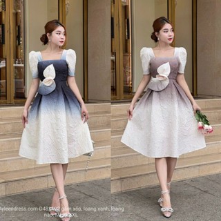 Đầm xoè loang màu đính bồng
