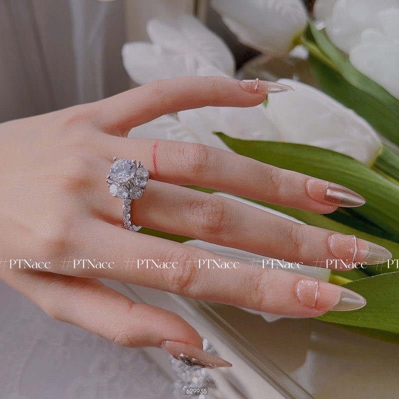 Nhẫn nữ xi bạch kim đài hoa hột cao vừa dễ thương .PTNACC.